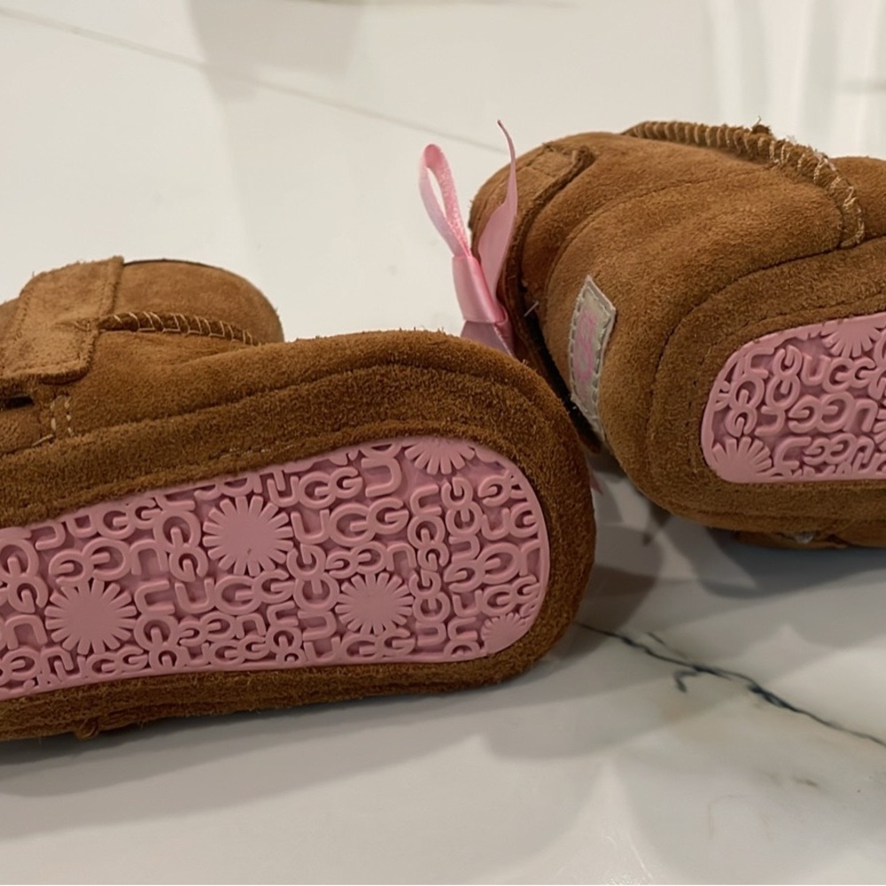 UGG baby Moccasins in Brown with Pink bows
